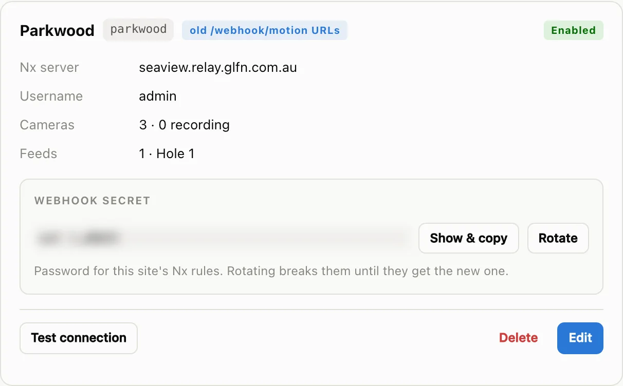 A site card with Nx server, cameras, feeds and the webhook secret